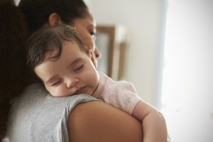 Mother With Sleeping Newborn